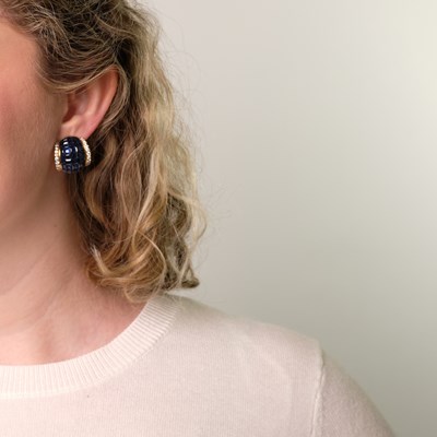 Lot 88 - Pair of Gold, Invisibly-Set Sapphire and Diamond Bombé Earrings