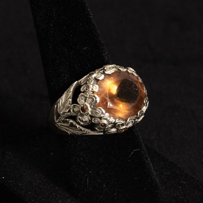 Lot 1095 - White Gold, Glass and Colored Diamond Ring