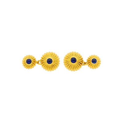 Lot 22 - Cartier Pair of Fluted Gold and Cabochon Sapphire 'Pasha' Cufflinks