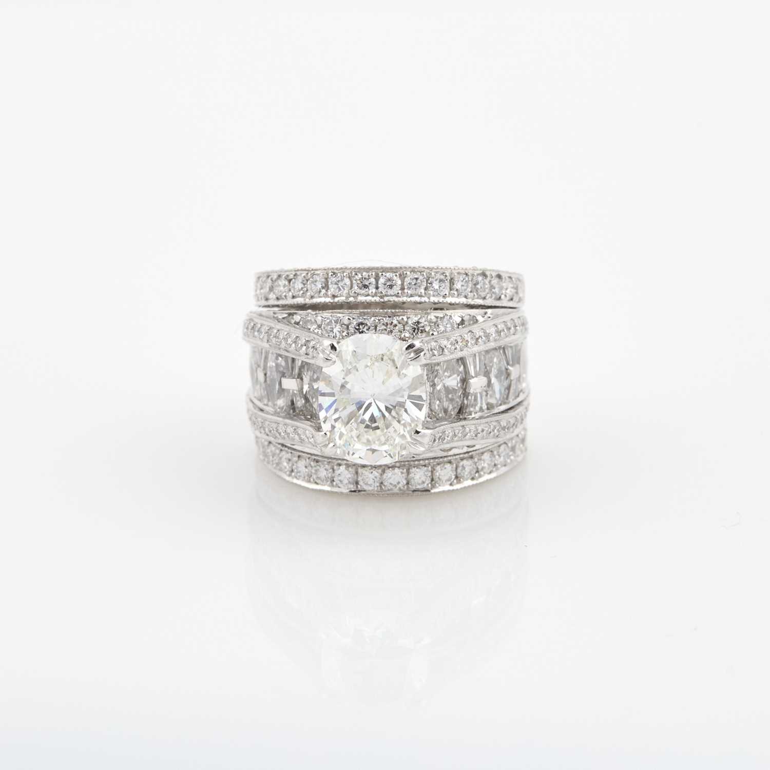 Lot 95 - Diamond Ring, 210 diamonds, center stone about 1.87 cts., 209 stones about 3.50 cts.,               Platinum 12 dwt. with copy of GIA Report #12