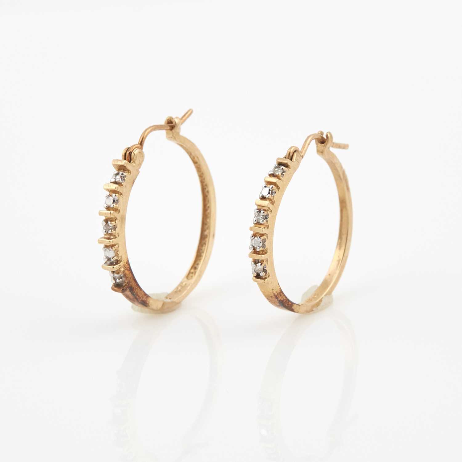 Lot 177 - Two Diamond Earrings, 10K 1 dwt.