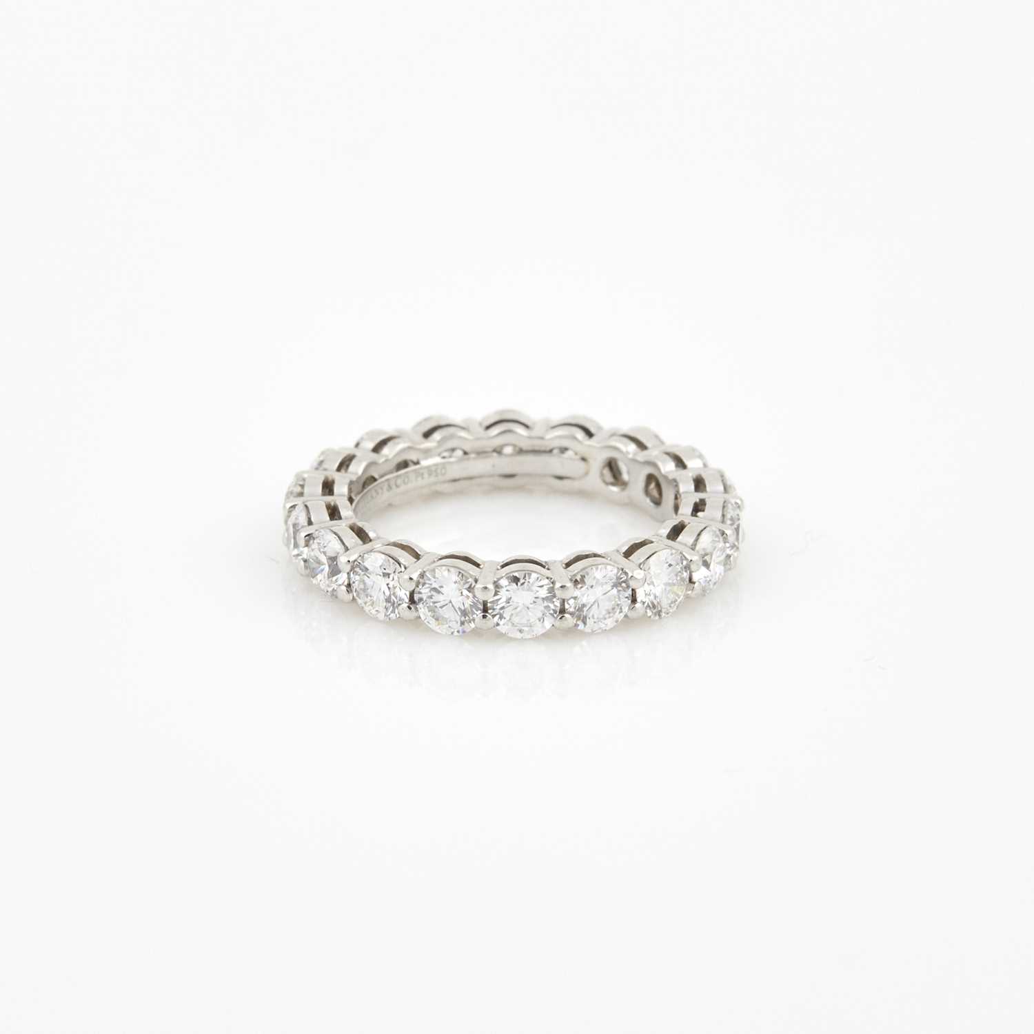 Lot 277 - Diamond Wedding Ring, 18 diamonds about 3.25 cts., Platinum 3 dwt., bears signature Tiffany & Co.