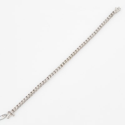 Lot 291 - Diamond Tennis Bracelet, 51 diamonds about 0.75 ct., 10K 7 dwt.
