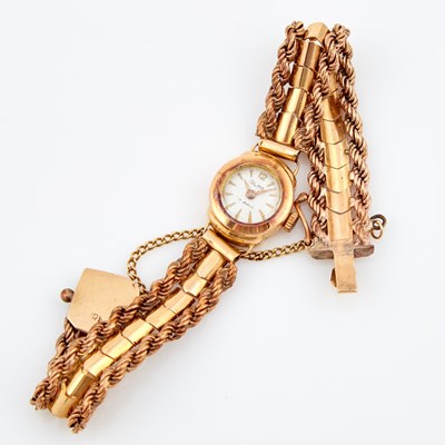 Lot 493 - Ladys Gold Wrist Watch, 17 Jewels, Swiss, 18K with metal band attached