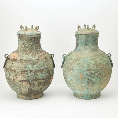 Lot 90 - A Pair of Chinese Bronze Lidded Wine Vessels