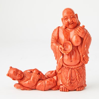 Lot 10 - A Chinese Coral Carving of Budai and an Attendant