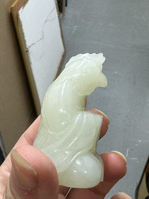 Lot 62 - A Group of Twelve Chinese White Jade Zodiac Figures and Stands