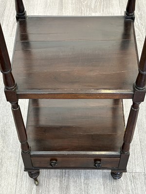 Lot 1057 - Regency Rosewood Three-tier Etagere