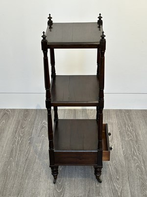 Lot 1057 - Regency Rosewood Three-tier Etagere