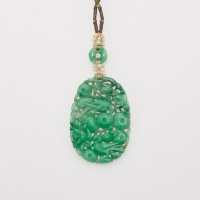 Lot 13 - A Chinese Jadeite and Coral Necklace