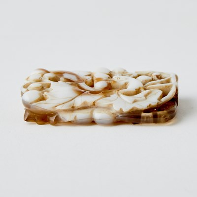 Lot 14 - A Chinese Carved Agate Plaque