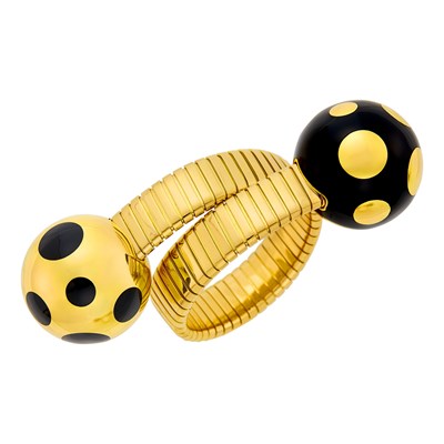 Lot 207 - Bulgari Gold and Black Enamel Crossover Tubogas Bracelet