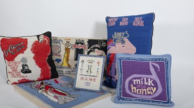 Lot 193 - A Group of Needlepoint Pillows Embroidered with Jerry Herman Musicals