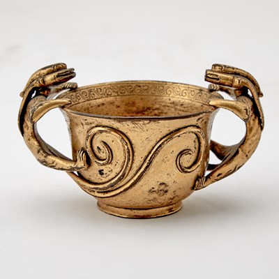 Lot 97 - A Chinese Gilt Bronze Twin-Handled ‘Chilong’ Cup