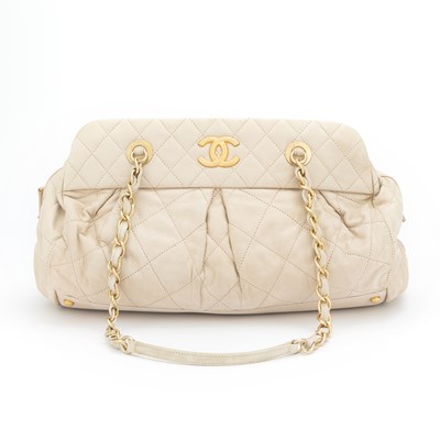 Lot 198 - Chanel Iridescent Beige Suede Quilted Bowling Bag