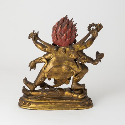 Lot 317 - A Large and Finely Cast Tibetan Gilt Bronze Figure of Mahakala