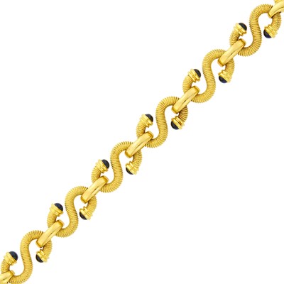 Lot 143 - Gold and Cabochon Sapphire 'S' Link Bracelet