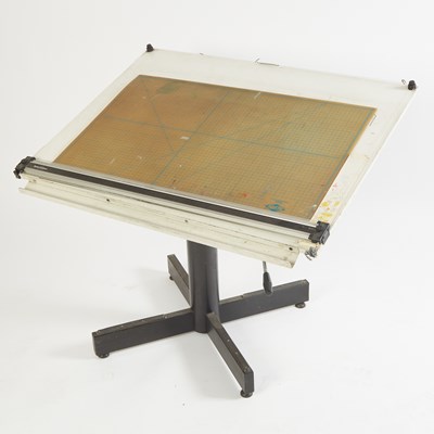 Lot 453 - Al Jaffee's drafting table, side table, and a group of his art supplies from his studio