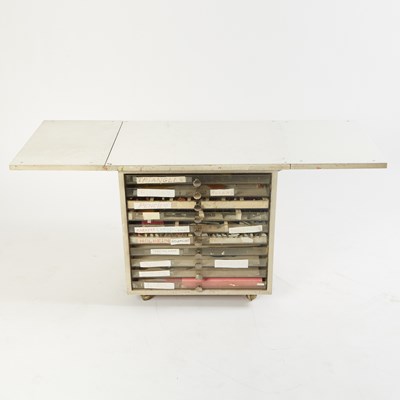 Lot 453 - Al Jaffee's drafting table, side table, and a group of his art supplies from his studio