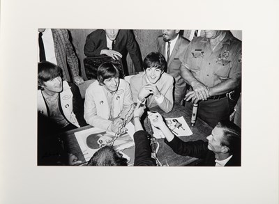 Lot 230 - The Beatles at altitude on their first American tour