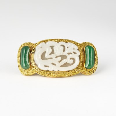 Lot 83 - A Chinese Peking Glass and Jade Brooch