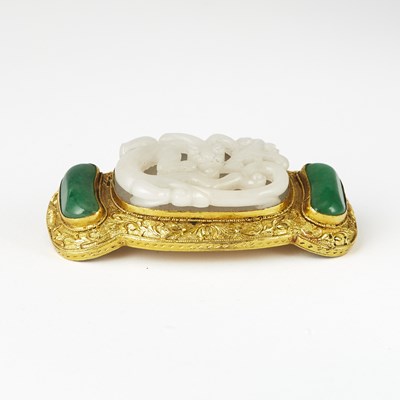 Lot 83 - A Chinese Peking Glass and Jade Brooch