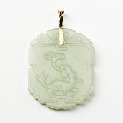 Lot 33 - A Chinese Celadon Jade Pendant