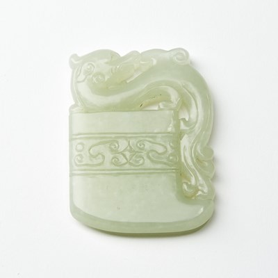 Lot 37 - A Chinese Celadon Jade Ax-Shaped Pendant