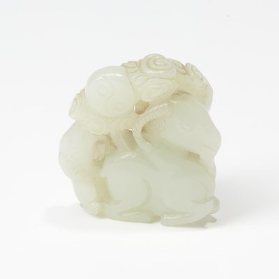 Lot 63 - A Chinese White Jade Carving of Three Rams