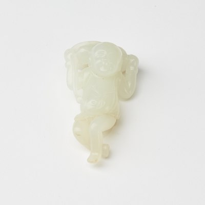 Lot 69 - A Chinese Translucent White Jade Figural Carving