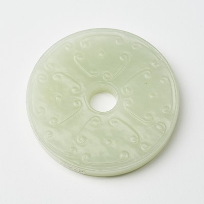 Lot 60 - A Chinese White Jade Bi