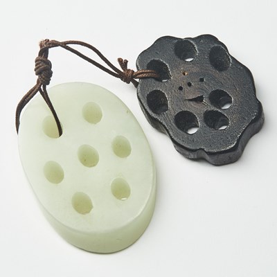 Lot 55 - A Chinese White Jade Pendant