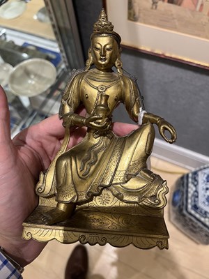 Lot 318 - A Matched Pair of Sino-Tibetan Gilt Bronze Figures of Guanyin