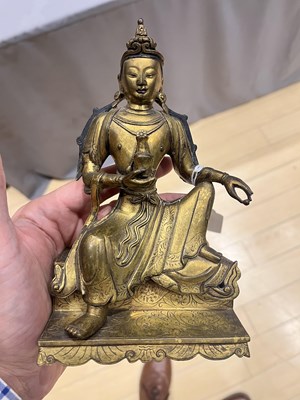 Lot 318 - A Matched Pair of Sino-Tibetan Gilt Bronze Figures of Guanyin
