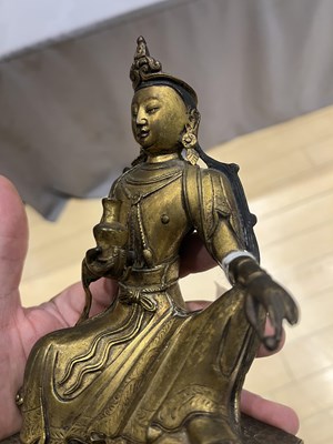Lot 318 - A Matched Pair of Sino-Tibetan Gilt Bronze Figures of Guanyin
