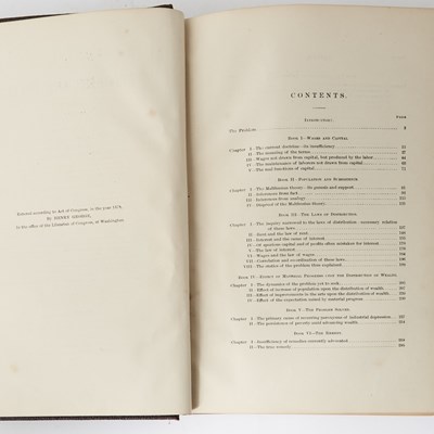 Lot 675 - The true first edition of Henry George's Progress and Poverty, an inscribed copy