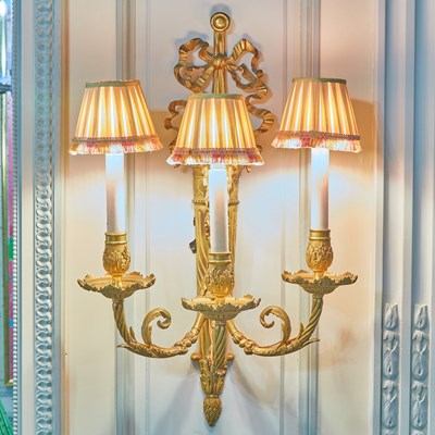 Lot 7 - Pair of Louis XVI Style Gilt Bronze Three-Light Sconces