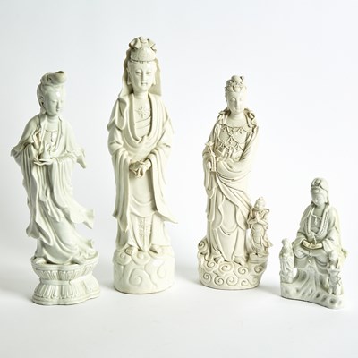 Lot 113 - Four Chinese Blanc de Chine Porcelain Figures of Guanyin