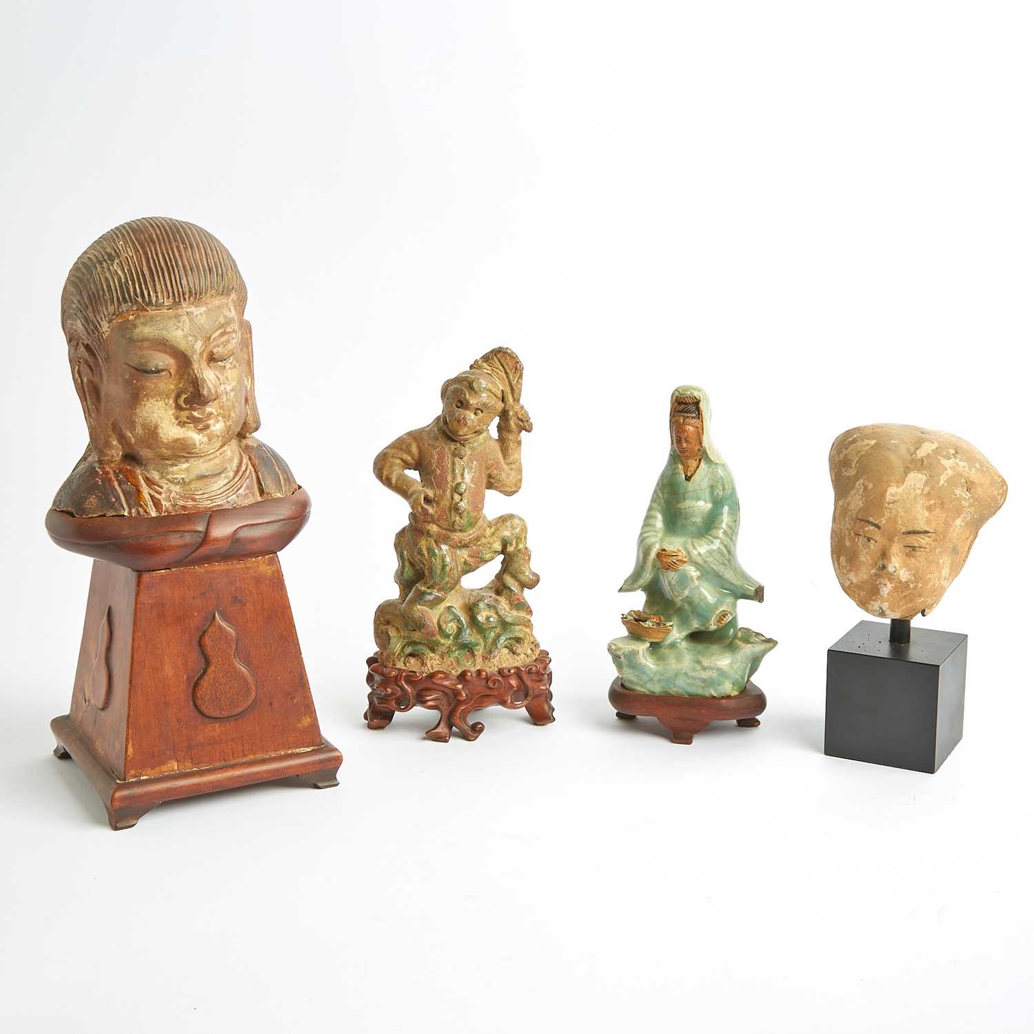 Lot 98 - Four Chinese Figural Pottery Sculptures