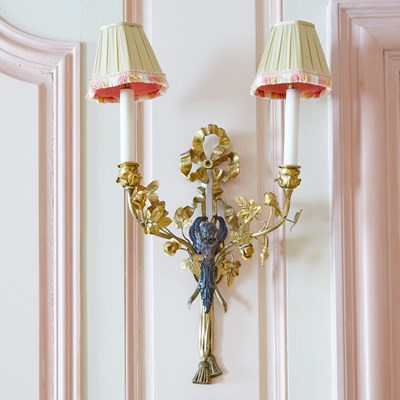 Lot 225 - Set of Four Louis XVI Style Patinated and Gilt Bronze Two- Light Sconces