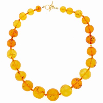 Lot 2026 - Amber Bead Necklace with Silver-Gilt Toggle Clasp