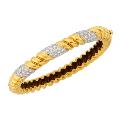 Lot 1020 - Two-Color Gold and Diamond Bangle Bracelet