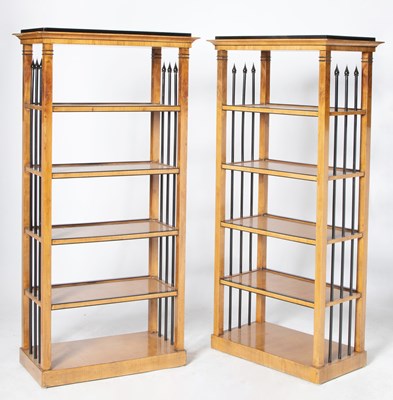 Lot 565 - Pair of German Neoclassical Ebonized and Fruitwood Étageres