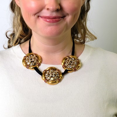 Lot 217 - René Boivin Three Gold, Diamond and Ruby Pendant Clip-Brooches, France, with Two Suede Necklaces