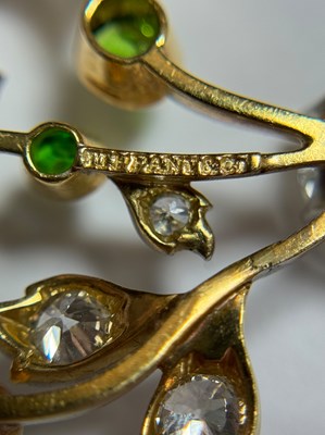 Lot 179 - Paulding Farnham for Tiffany & Co. Antique Gold, Platinum, Diamond and Demantoid Garnet Bow Brooch