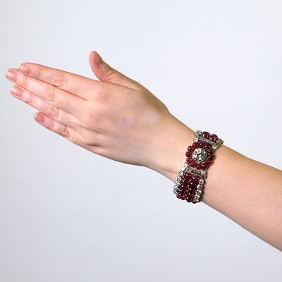 Lot 226 - Wide Platinum, Diamond and Cabochon Ruby Bracelet