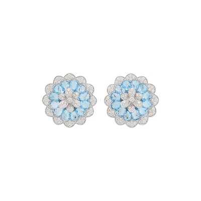 Lot 1045 - Pair of White Gold, Blue Topaz Briolette and Diamond Flower Earrings