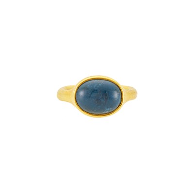 Lot 2075 - Gold and Cabochon Blue Tourmaline Ring