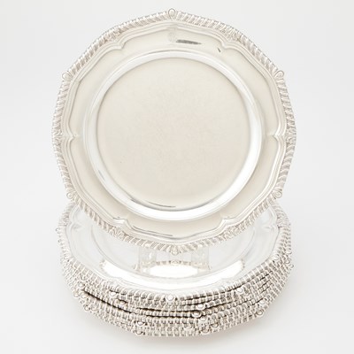 Lot 242 - Set of Twelve George III Sterling Silver Dinner Plates