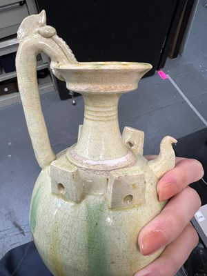 Lot 156 - A Chinese Sancai Glazed Pottery Ewer